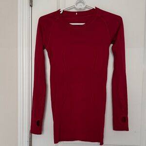 Lulu lemon swiftly tech long sleeve shirt. Hip length. Size 4. Good as new.